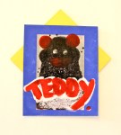 “teddy (hearts) you”, 2014. acrylic on photograph and found&nbsp;cardboard